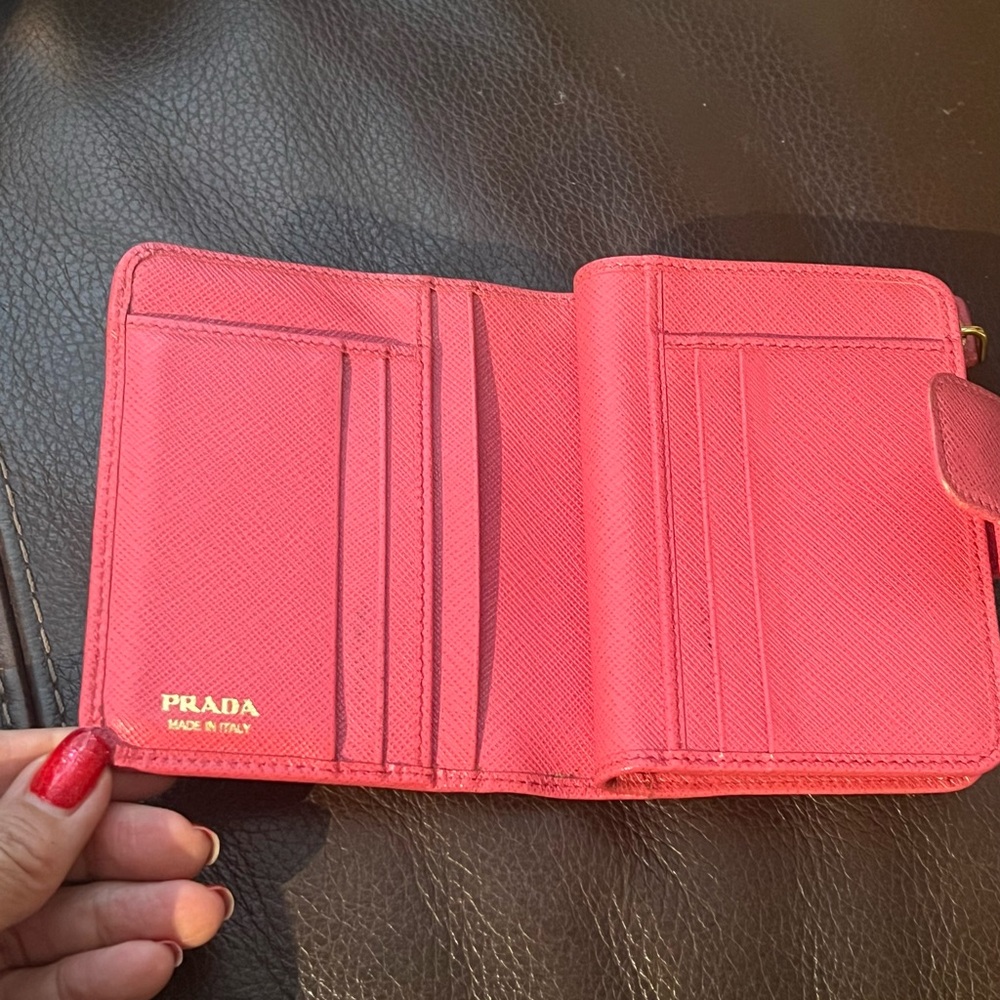 Prada pink Saffiano coin purse wallet with gold hardware.
